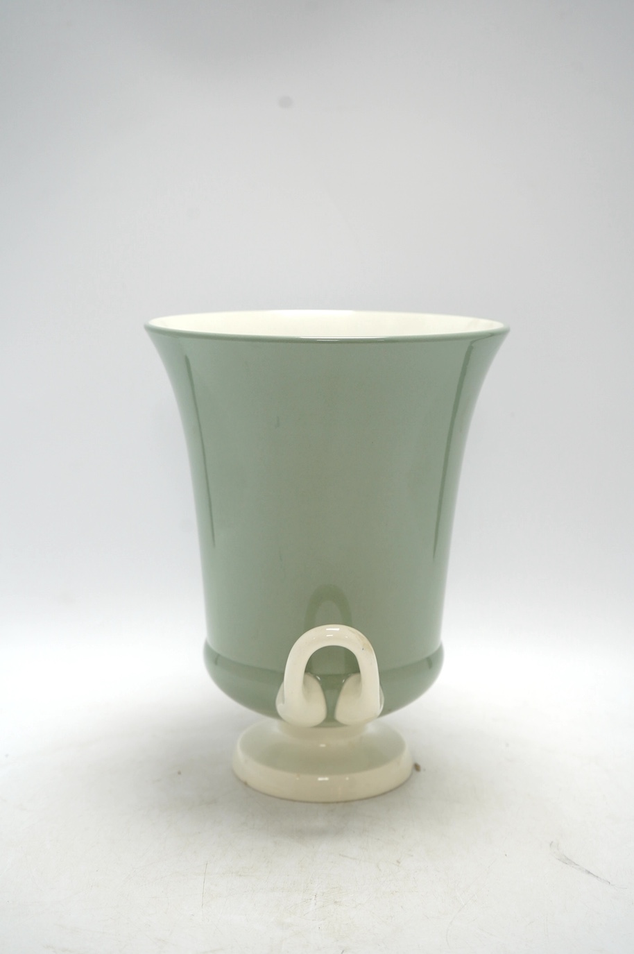 Keith Murray, a Wedgwood celadon glazed two handled vase, 25.5cm. Condition - good